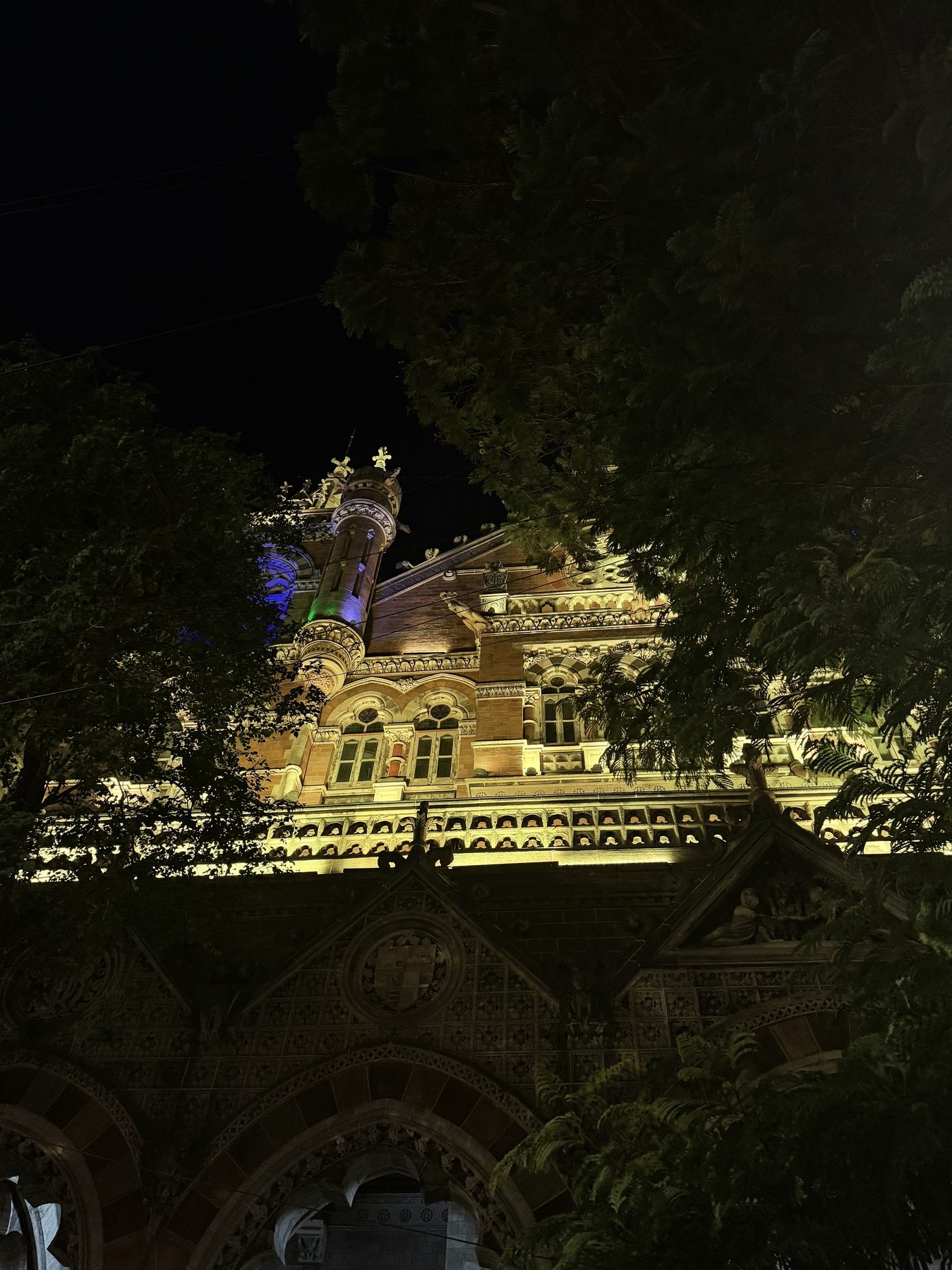 Illuminated Gothic facade of CSMT at night